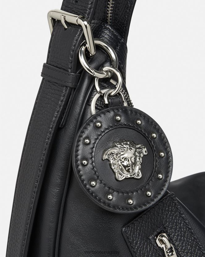 Versace llavero con tachuelas de medusa hombres negro accesorios H88R0H1663