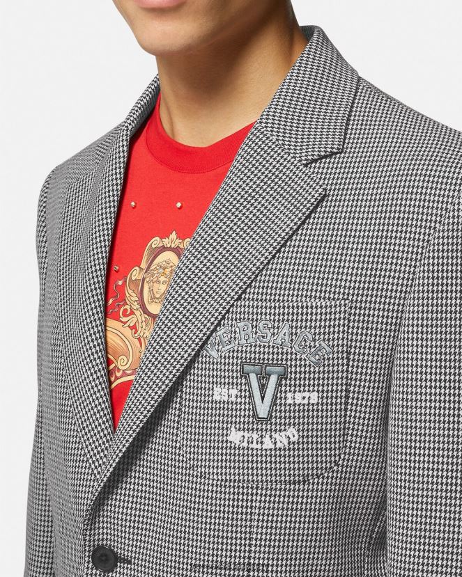 Versace blazer universitario con logo de pata de gallo hombres blanco negro ropa H88R0H1278