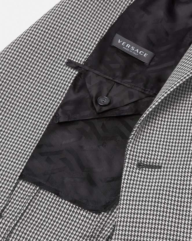 Versace blazer universitario con logo de pata de gallo hombres blanco negro ropa H88R0H1278