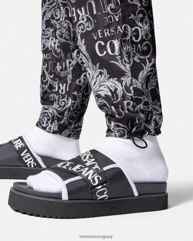 Versace pantalones de alta costura con logo hombres negro y estampado ropa H88R0H2431