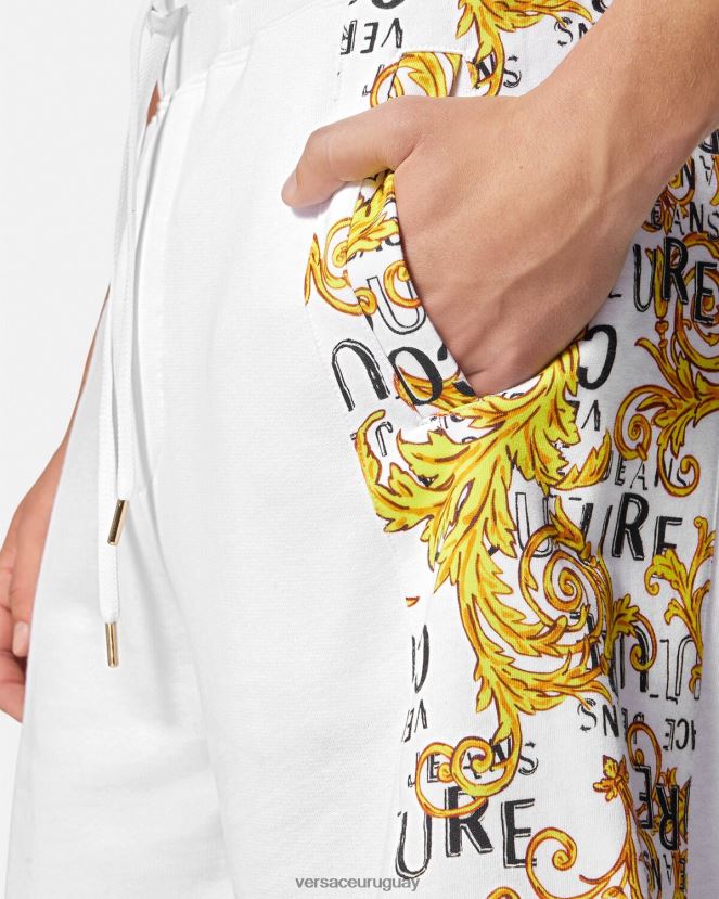 Versace shorts deportivos de alta costura con logo hombres oro y blanco ropa H88R0H2424