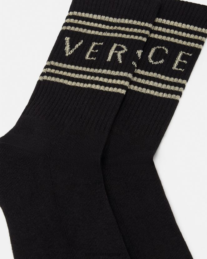Versace calcetines con logo vintage años 90 mujer oro negro ropa interior y ropa de playa H88R0H1103