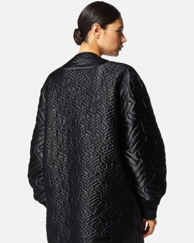Versace chaqueta reversible con orquídeas medusa mujer negro y estampado ropa H88R0H99