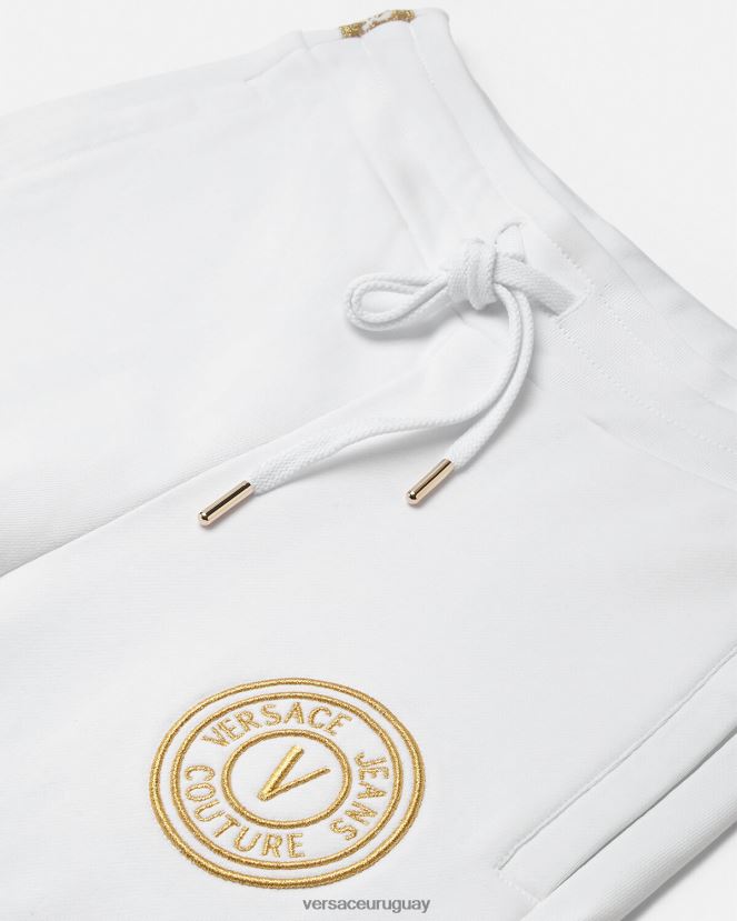 Versace pantalones deportivos con emblema en V mujer oro y blanco ropa H88R0H2245