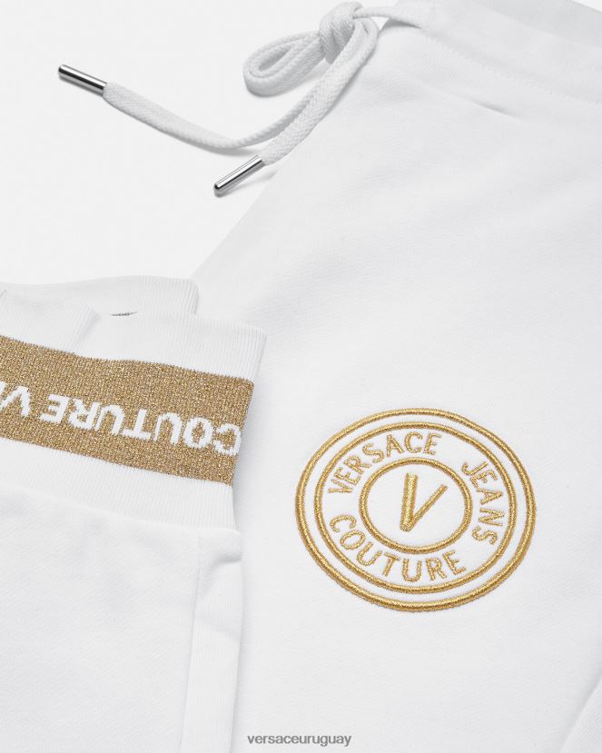 Versace pantalones deportivos con emblema en V mujer oro y blanco ropa H88R0H2245