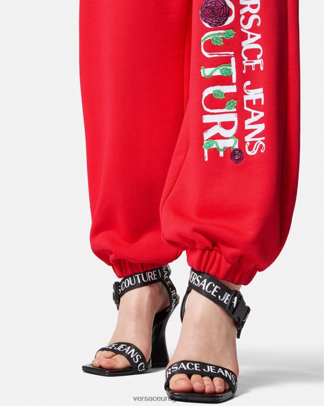 Versace pantalones deportivos con logo y rosas mujer naranja ropa H88R0H2177