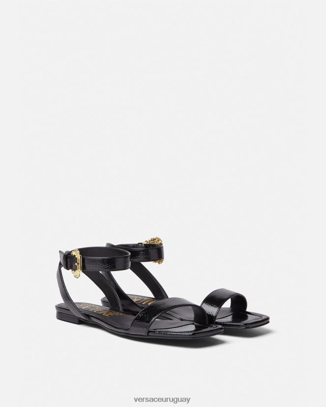 Versace sandalias planas Millie con hebilla barroca mujer negro zapato H88R0H2259