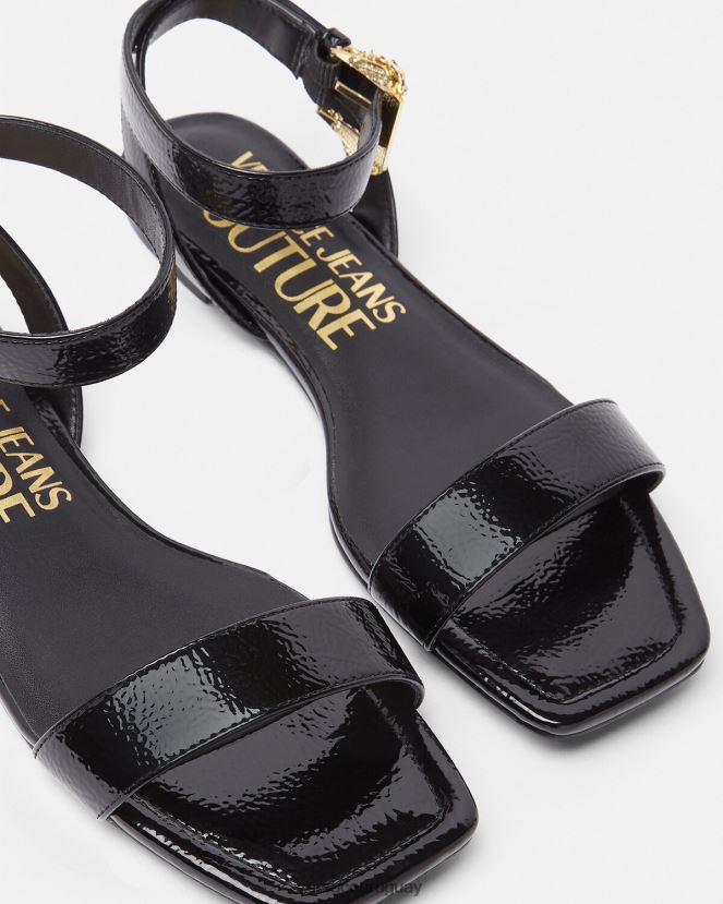 Versace sandalias planas Millie con hebilla barroca mujer negro zapato H88R0H2259