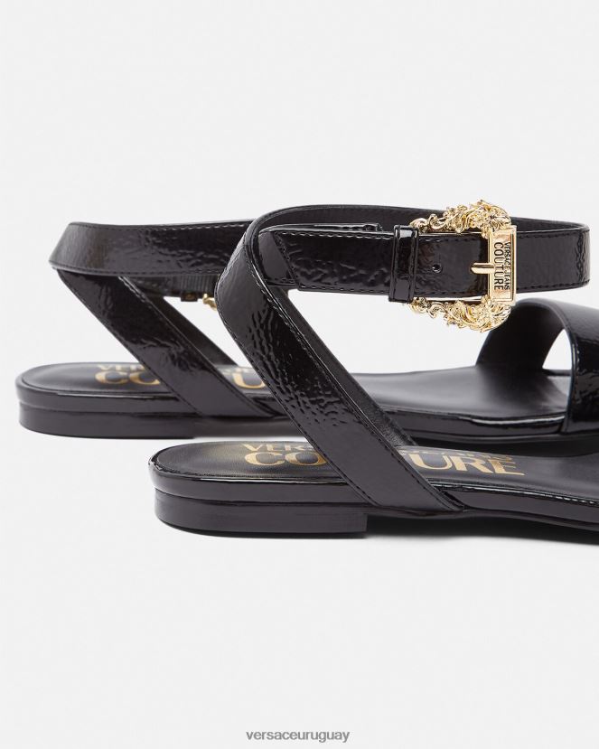 Versace sandalias planas Millie con hebilla barroca mujer negro zapato H88R0H2259