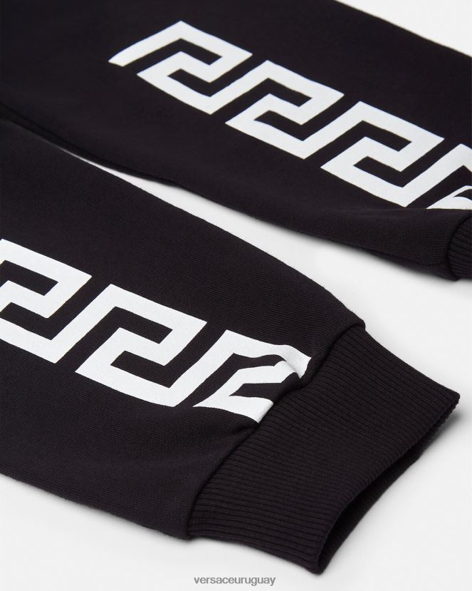 Versace pantalones deportivos con greca niños negro ropa H88R0H2099