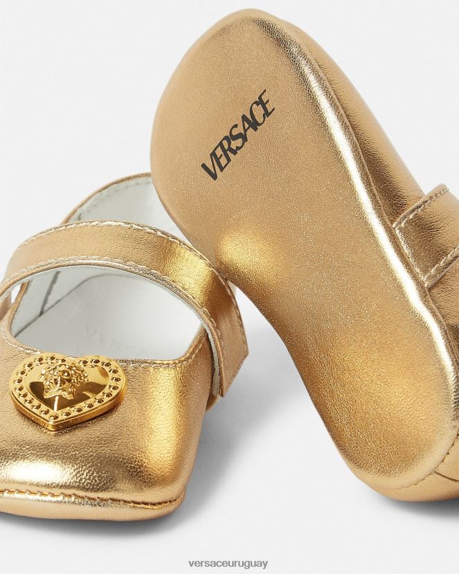 Versace bailarinas de bebé con medusa y corazón niños oro zapato H88R0H1847